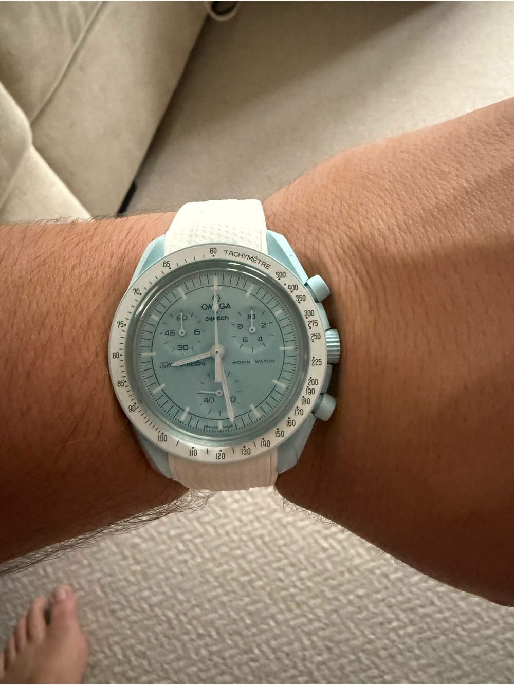 Swatch Light Blue Dial Watch with White Strap